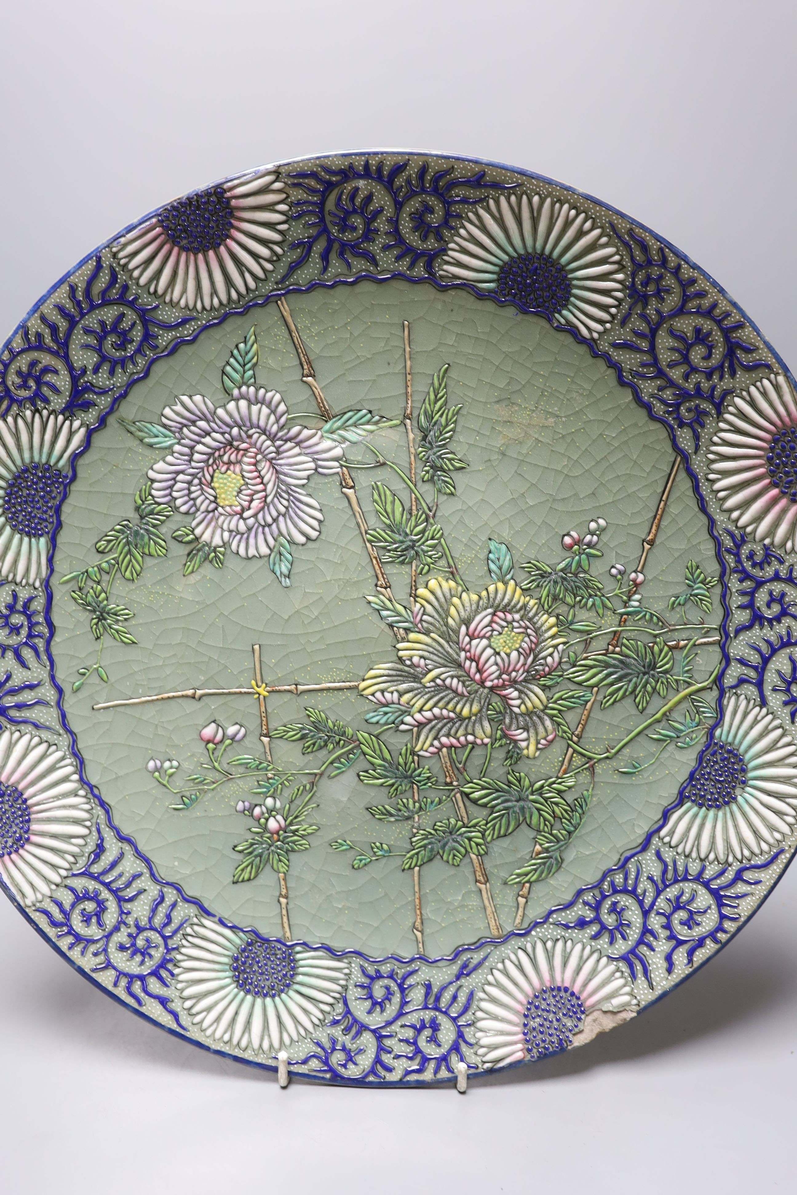A pair of Japanese pottery moriage celadon ground dishes, early 20th century, 38cm